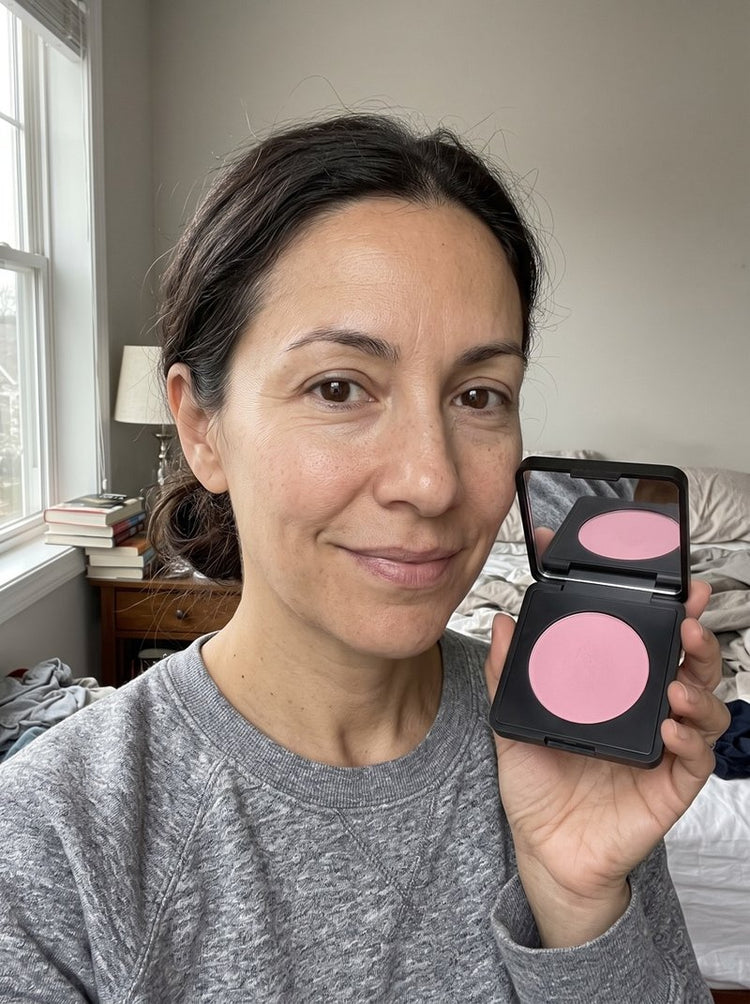 Michelle at home with the brightener on, holding the compact