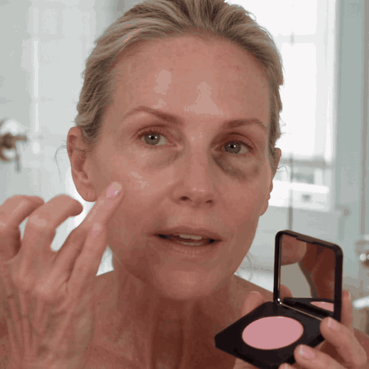 Applying the brightener under the eye